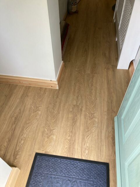 Wood effect Luxury Vinyl Tiles flooring in hallway