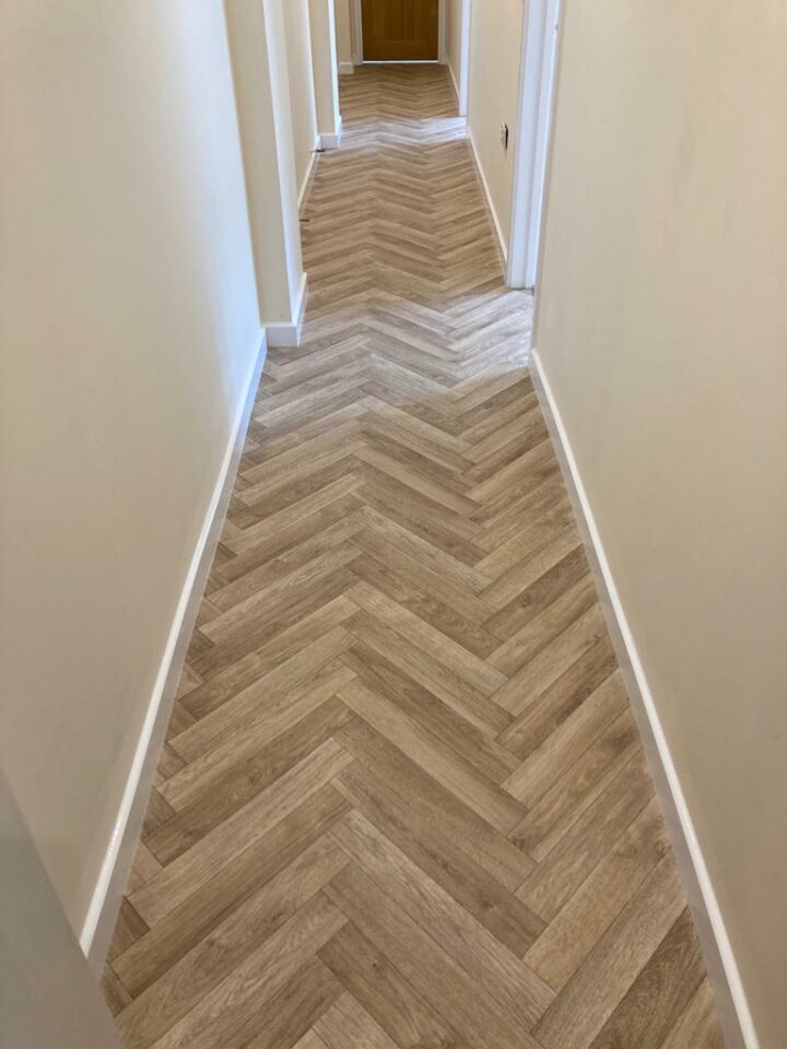 Herringbone wood floor in hallway