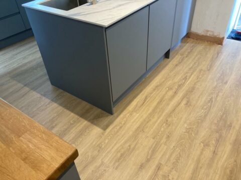 Wood effect Luxury Vinyl Tiles flooring in kitchen