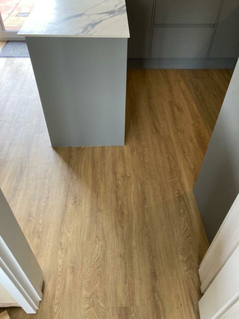 Wood effect Luxury Vinyl Tiles flooring in kitchen